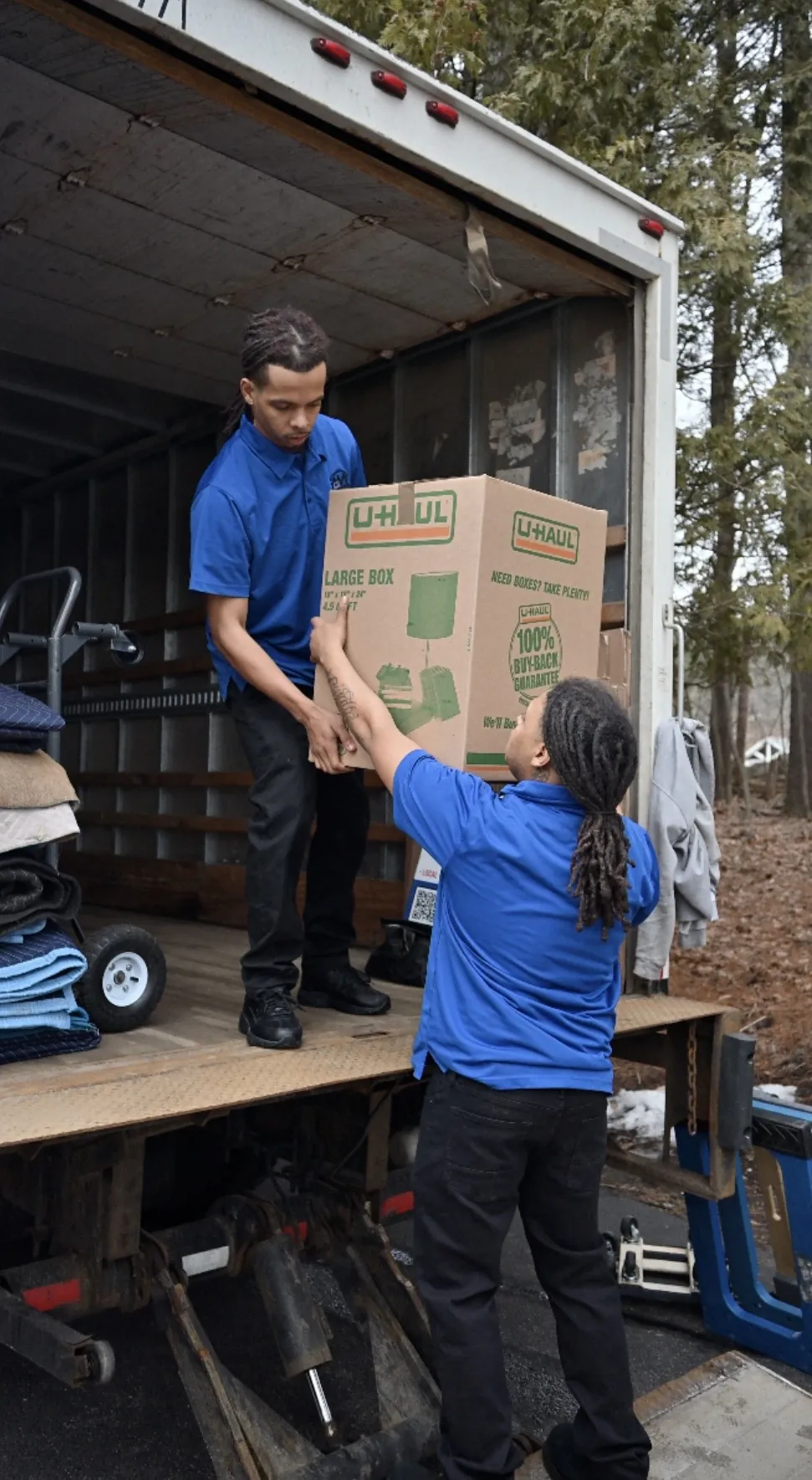 EAM Moving crew loading a moving truck in Bedford, New Hampshire