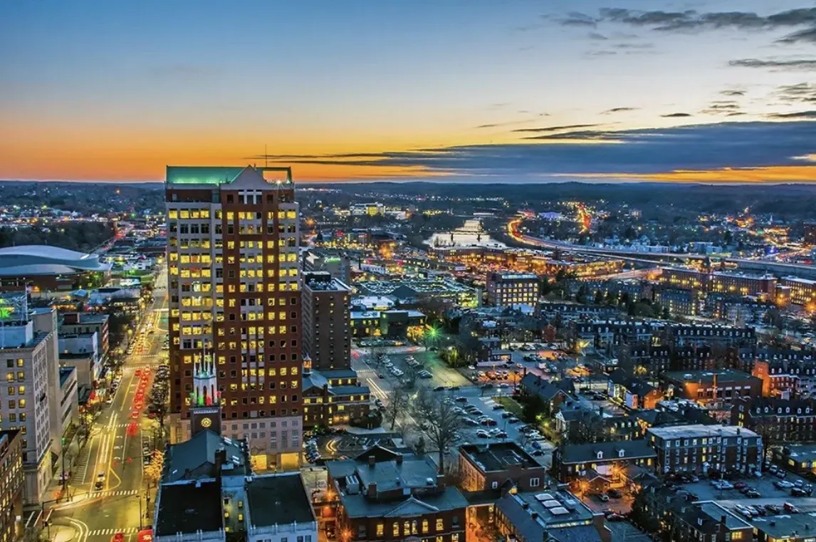 Aerial view of downtown Manchester, New Hampshire at sunset